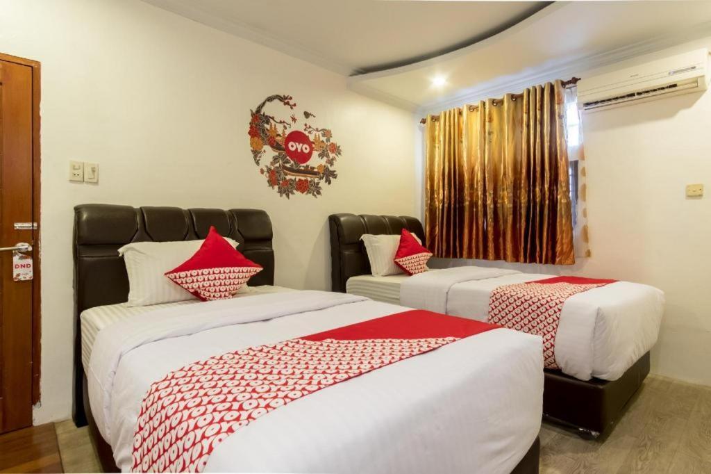 Oyo 619 Naufal Guest House Syariah ميدان المظهر الخارجي الصورة
